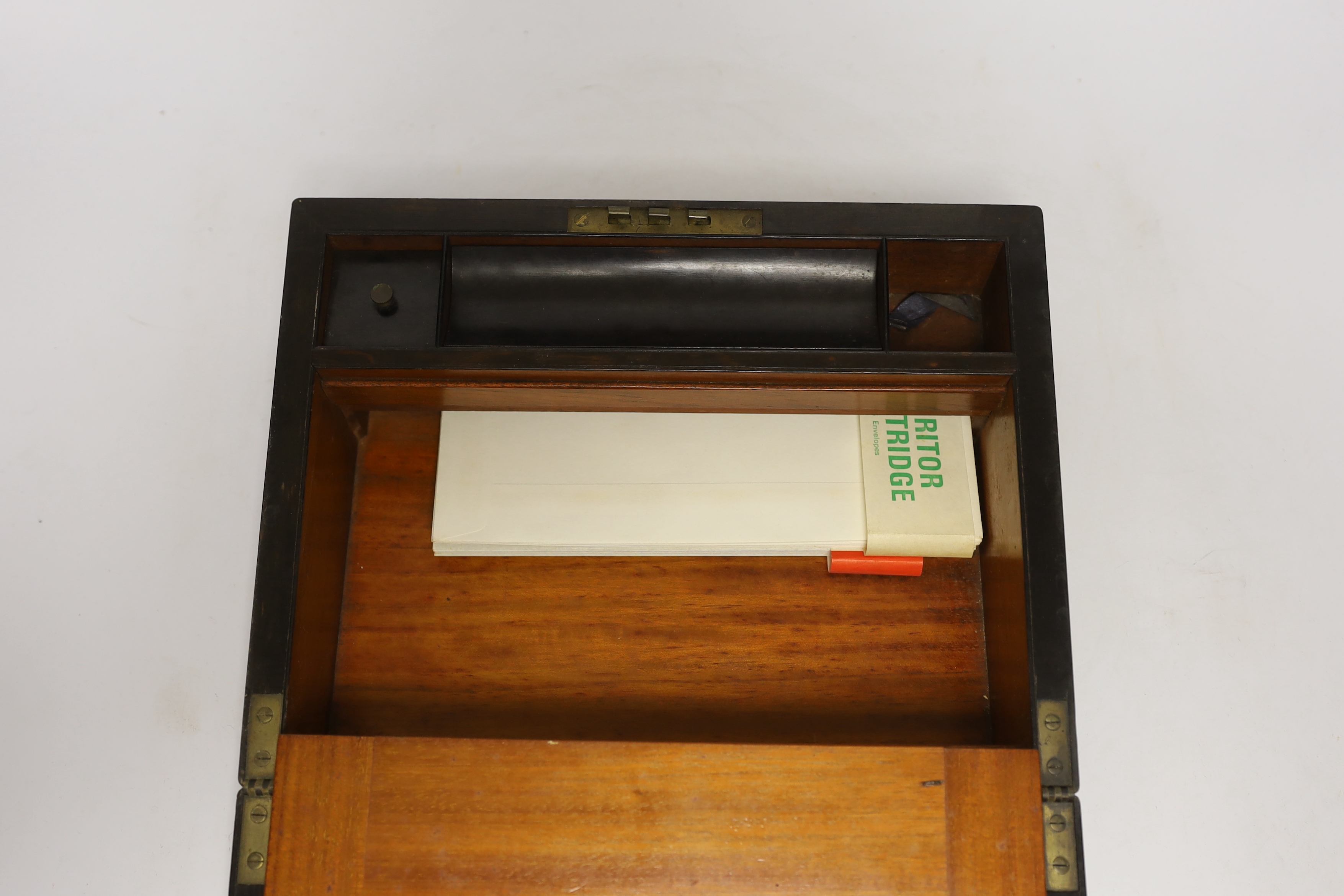 A Victorian burr walnut writing box with tooled leather slope and brass mounts, 30cm wide